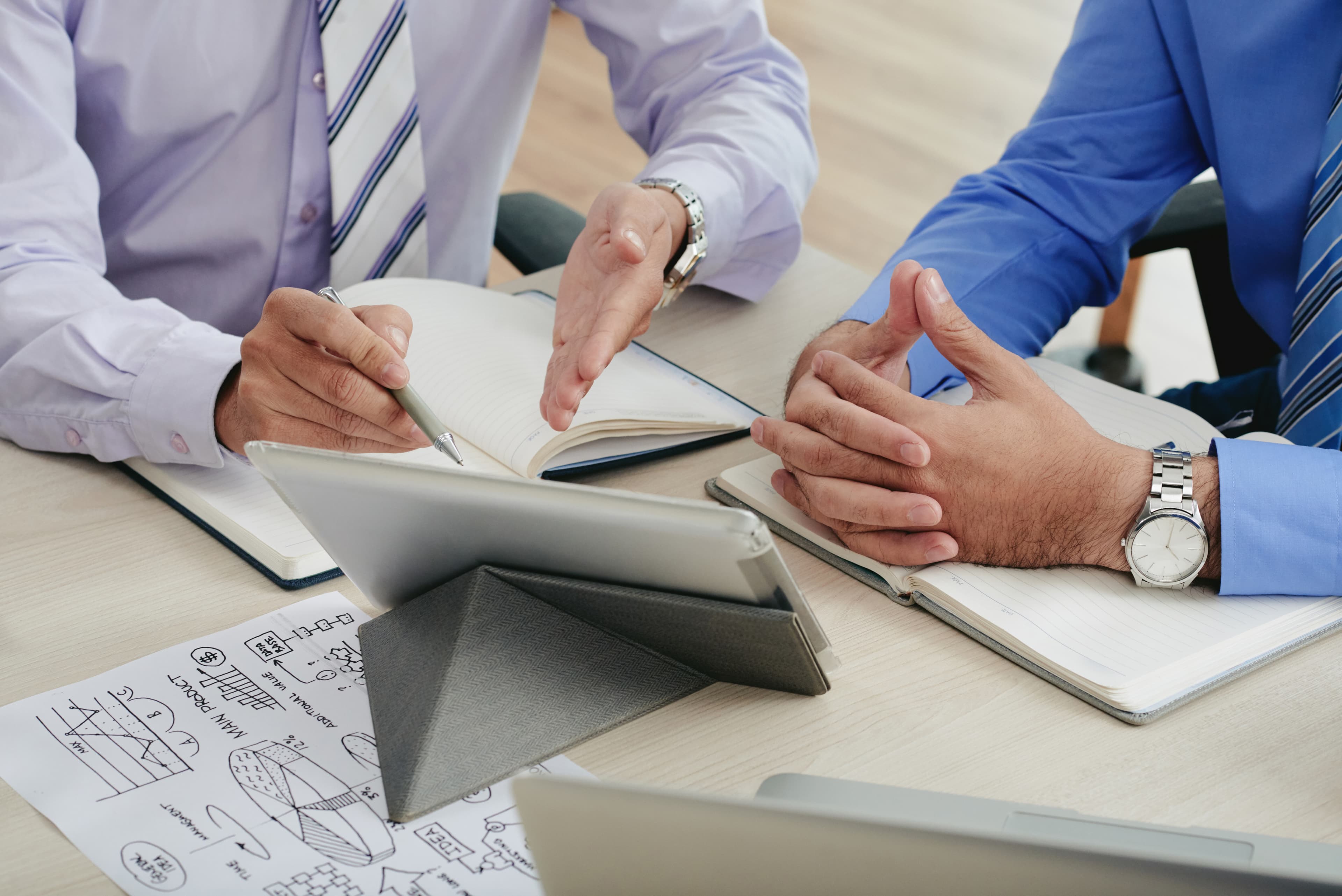 Advisors supporting a client strategy session